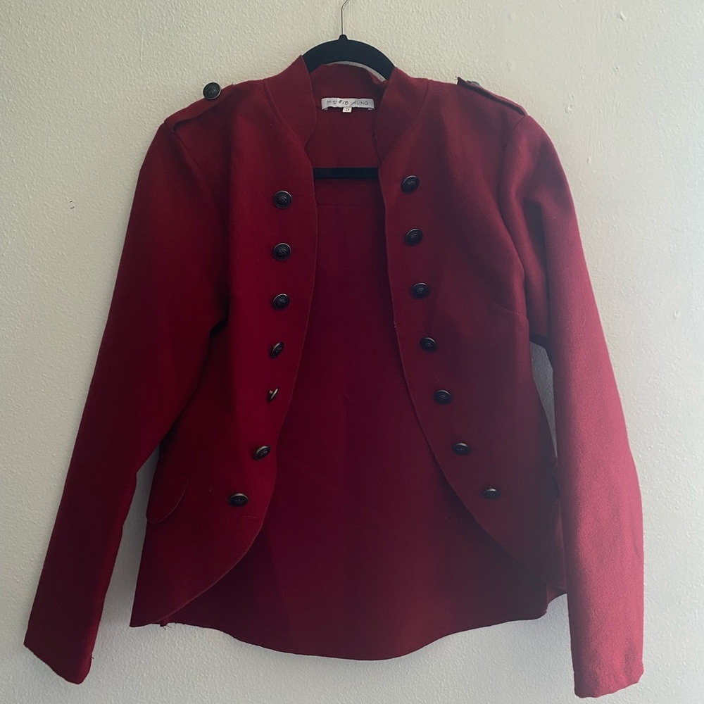 Red blouse ringmaster like